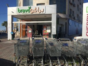 כל סט שינויים Buying Hanukkah Candles in Ramallah